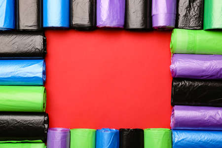 Frame made of garbage bags on color backgroundの写真素材