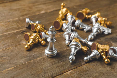 Chess pieces on wooden backgroundの写真素材