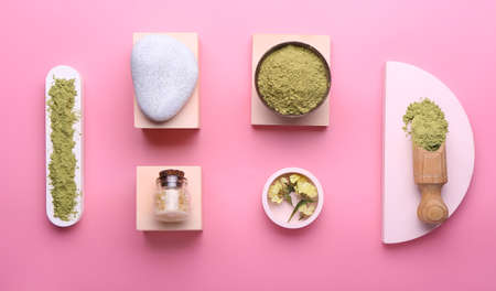 Composition with dry henna powder on color backgroundの写真素材