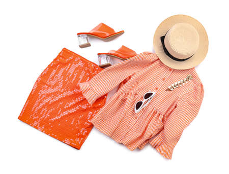 Stylish female clothes with accessories on white backgroundの写真素材