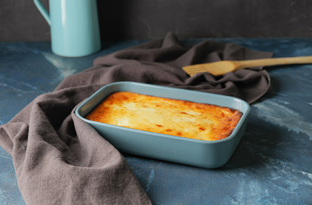 Dish with tasty cottage cheese casserole on tableの写真素材