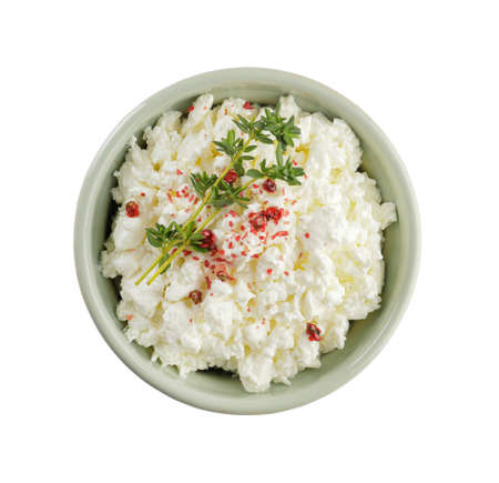 Bowl with cottage cheese on white backgroundの写真素材