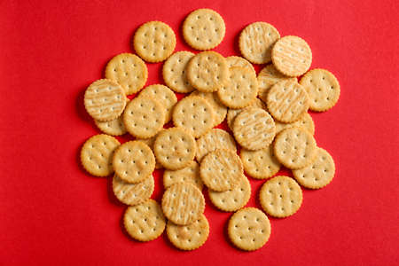 Tasty crackers on color backgroundの写真素材