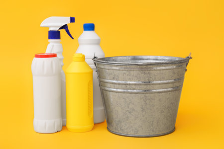 Set of cleaning supplies on color backgroundの写真素材