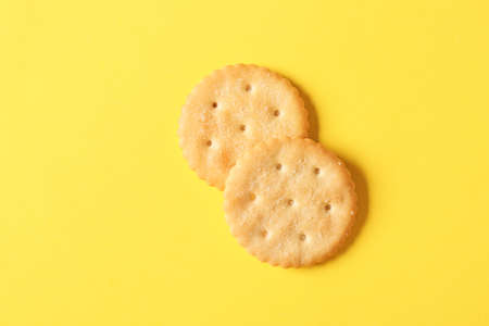 Tasty crackers on color backgroundの写真素材