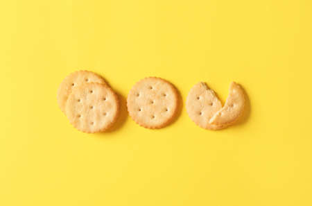 Tasty crackers on color backgroundの写真素材