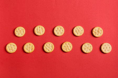 Tasty crackers on color backgroundの写真素材