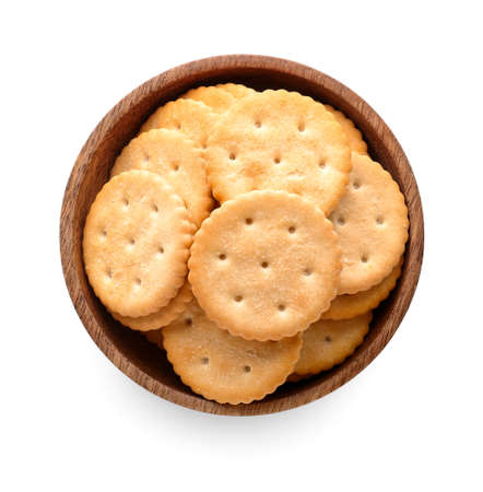 Bowl with tasty crackers on white backgroundの写真素材
