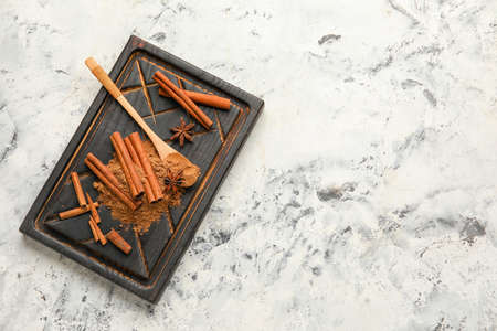 Composition with aromatic cinnamon on light backgroundの写真素材