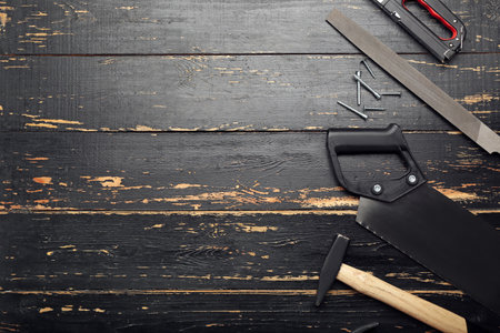 Set of tools on dark wooden backgroundの写真素材