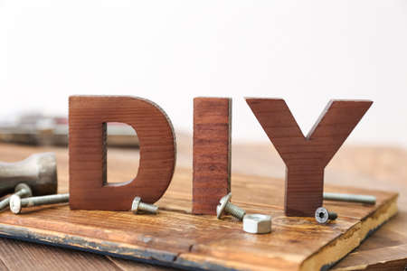Word DIY on wooden background, closeupの写真素材
