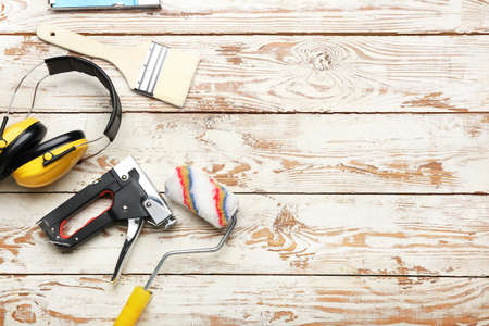 Set of carpenter's tools on light wooden backgroundの写真素材