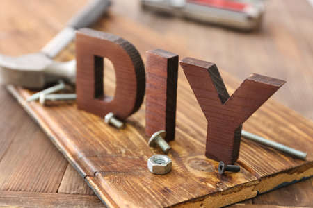 Word DIY on wooden background, closeupの写真素材
