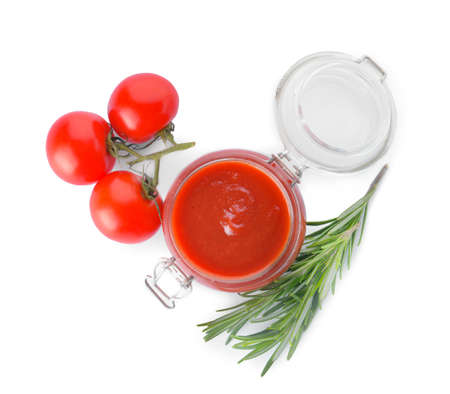Jar with organic tomato sauce on white backgroundの写真素材
