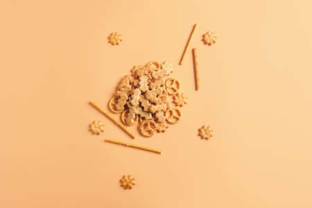 Tasty different crackers on color backgroundの写真素材