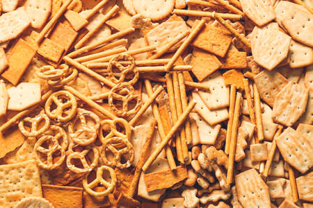 Tasty different crackers as backgroundの写真素材