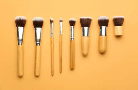 Set of makeup brushes on color backgroundの写真素材