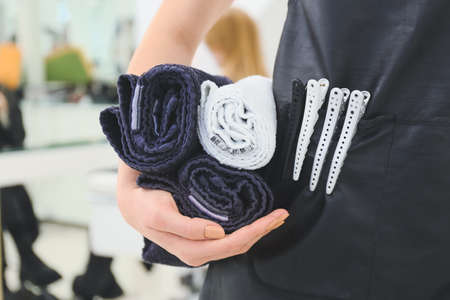 Professional hairdresser with tools in beauty salonの写真素材