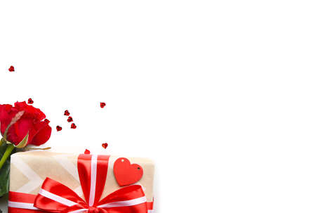 Beautiful gift with rose flower on white backgroundの写真素材