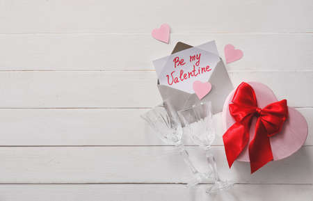 Beautiful composition for Valentine's Day on white wooden backgroundの写真素材