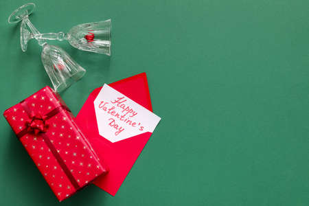 Composition with gift for Valentine's Day on color backgroundの写真素材