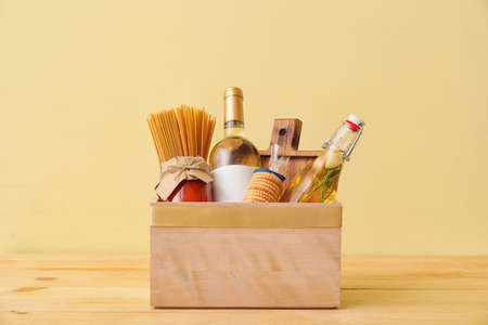 Gift basket with products on color backgroundの写真素材