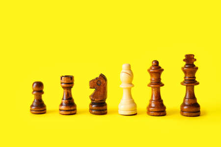 Chess pieces on color background