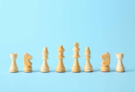 Chess pieces on color background