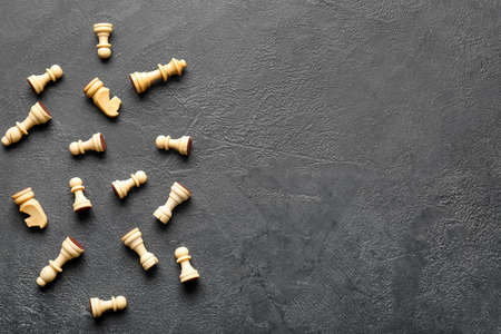 Chess pieces on dark background