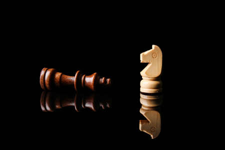 Chess pieces on dark background