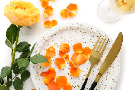 Festive table setting for Valentines Day celebration on white background