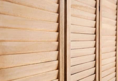 Closeup view of wooden folding screenの写真素材