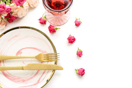 Festive table setting for Valentines Day celebration on white backgroundの写真素材