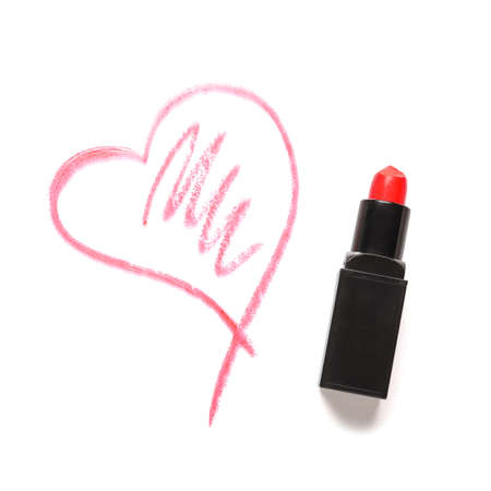 Heart and red lipstick on white backgroundの写真素材