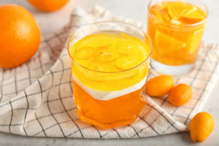 Glasses of tasty jelly on light backgroundの写真素材