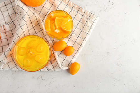 Glasses of tasty jelly on light backgroundの写真素材