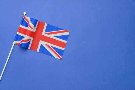 National flag of the United Kingdom on color backgroundの写真素材