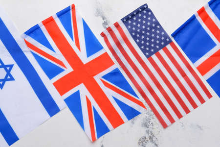 Different flags on light background
