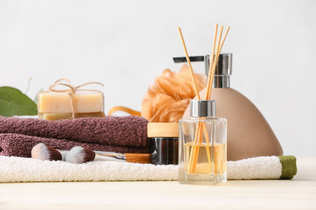 Spa set with aroma diffuser on light backgroundの写真素材