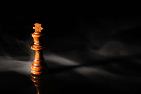 Chess piece on dark backgroundの写真素材