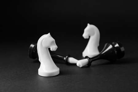 Chess pieces on dark backgroundの写真素材