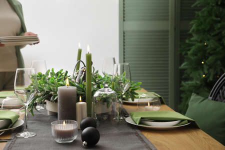 Beautiful table setting for Christmas dinner at home