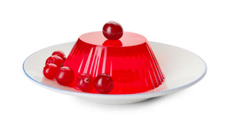 Plate with tasty cranberry jelly on white backgroundの写真素材