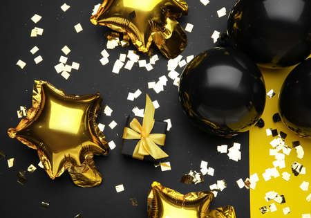 Beautiful different balloons on color backgroundの写真素材