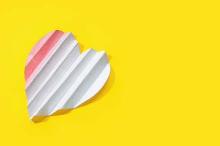 Paper heart on color backgroundの写真素材