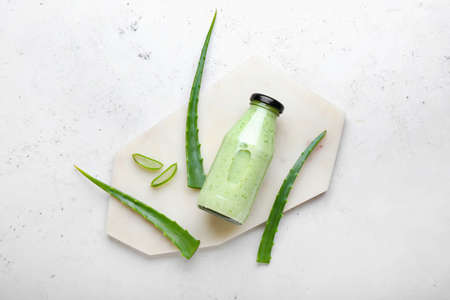 Bottle of healthy aloe juice on white backgroundの写真素材
