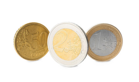 Golden coins on white backgroundの写真素材