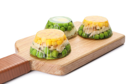 Board with tasty aspic on white background