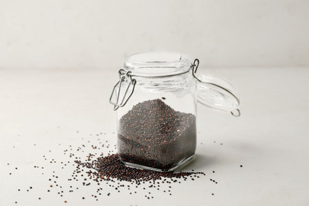 Jar of healthy quinoa on white backgroundの写真素材