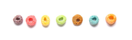 Tasty cereal rings on white background